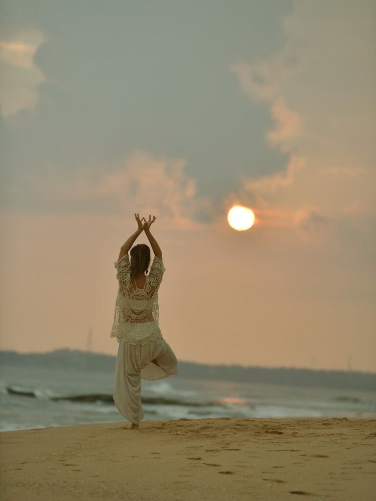 mollie-mendoza-sunset-beach-asana